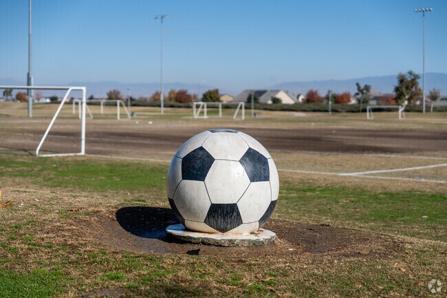 A fixture of a soccer ball sits at one of the fields at the Sports Village in Panama.
