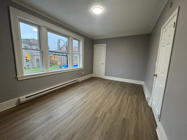 Bedroom 1 (Street-Facing Windows)