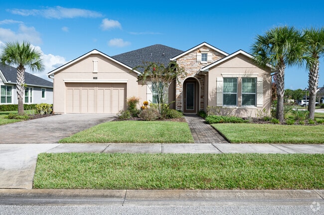 This Ormond Beach home boasts beautiful stonework and tons of curb appeal.