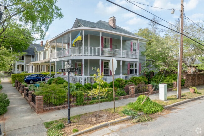 This stunning wrap-around porch makes a statement on this street corner in Elmwood Park.