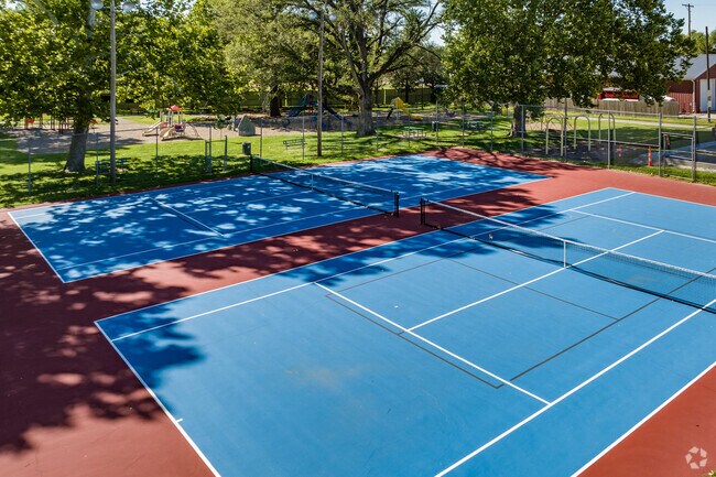 Meet up with friends at Miller Park for a friendly game of tennis.