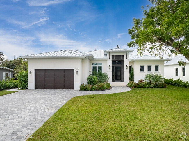 New construction Contemporary Style homes are prevalent throughout Naples Park.