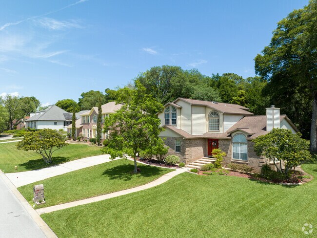 Well-kept lawns are the pride of the Gilmore-Beacon Hills neighborhood.