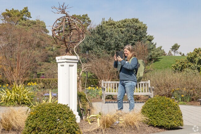The New York Botanical Gardens is a sprawling museum of plants near Pelham Gardens.