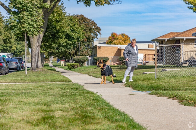 Thurston Woods residents and their dogs can enjoy the sunshine on a fall day.