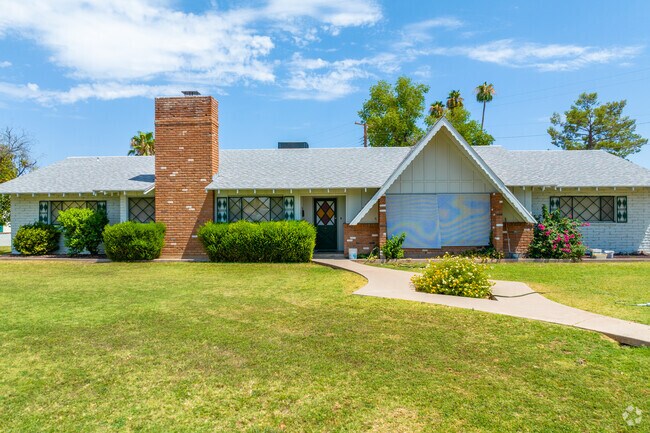 Embrace the romantic charm and distinctive style of Mesa Patios' Tudor Revival architecture.