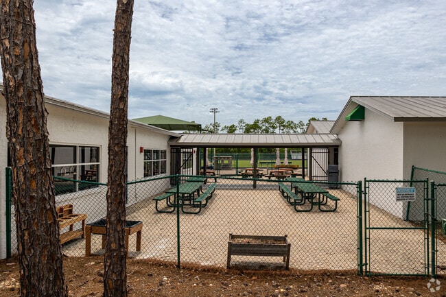 Seacrest Country Day School in Naples features outdoor sitting areas between buildings.