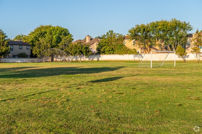 Open green space at Plaza Vista K-8 School in Westpark is used for sports and recreation.