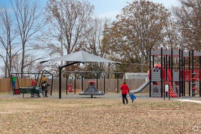 The kids are enjoying the new playground at the Civic Center in High Ridge.