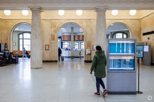 Catch a train from Penn Station near Middle East.