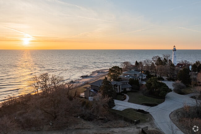 The Windpoint Lighthouse, built in 1880, offers tours and lakefront views.