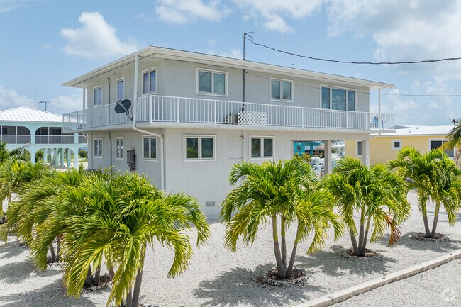 Many of the homes in Cudjoe Key offer manicured front lawns with landscaping.