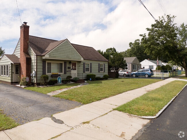 A row of cape cods to admire in Liberty Heights, MA.