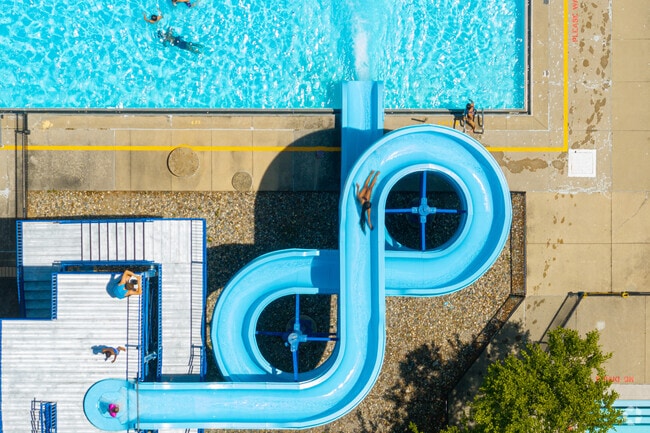 Visitors cool off at the McMillen Park pool in the Village Woods area.