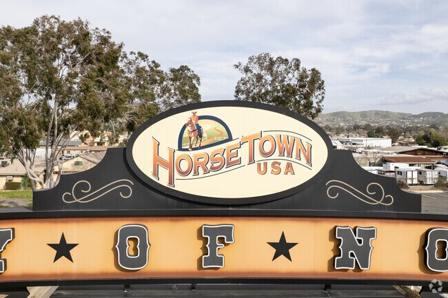 As soon as you enter the town, look up and you'll see this welcome sign.