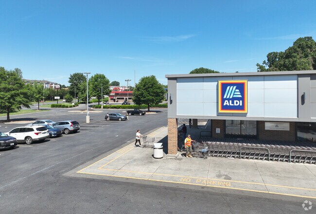 Enderly Park residents shop daily goods at Aldi and Compare Foods nearby.