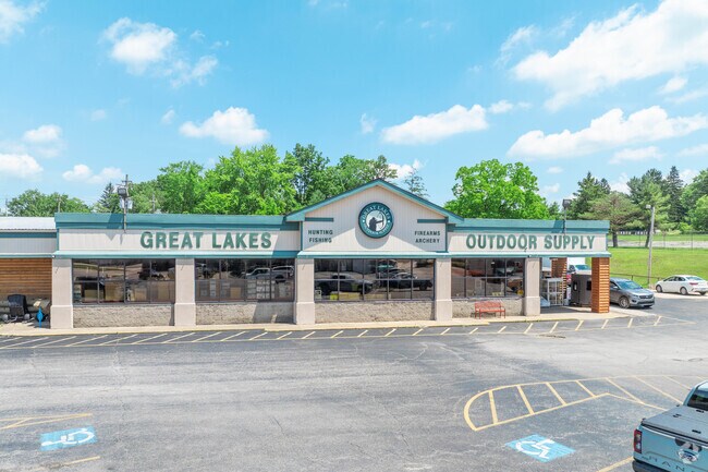 Great Lakes Outdoor Supply has a parking lot for cars and hitching posts for Amish buggies.