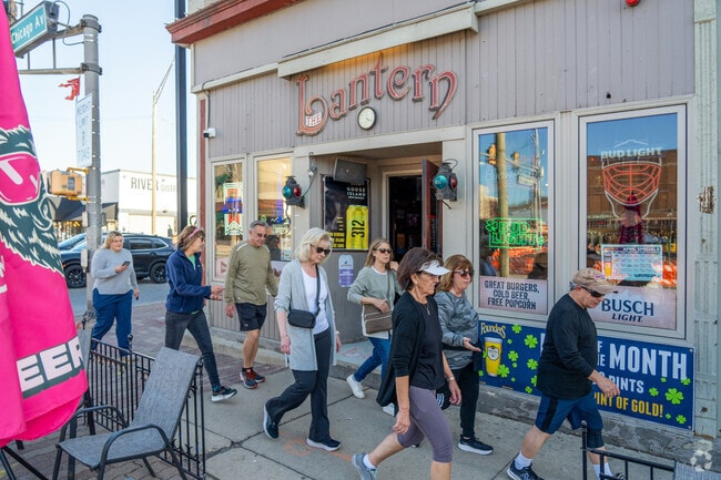 Friends can enjoy dinner and a cold beer at The Lantern near the Naperville Historic District.