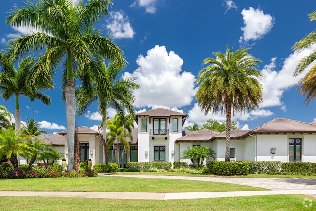 Quail West has many large stucco homes with contemporary designs.