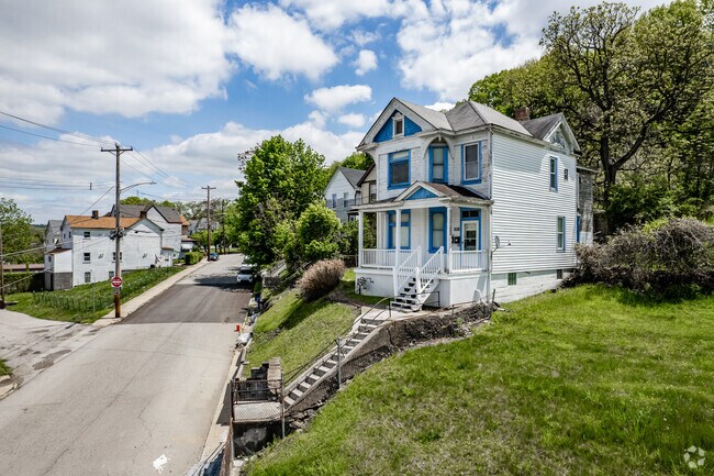 Many homes here sit atop hills and have long stairways to the front porch.