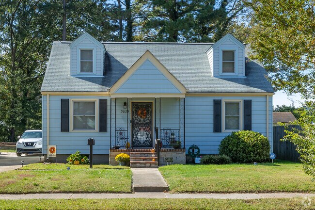 Cottage-style homes with manageable yards offer cozy living in Elmhurst.
