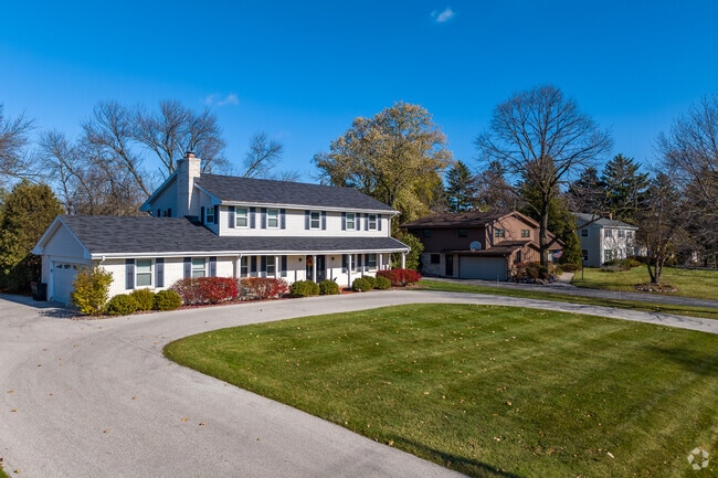 Colonial homes with large front yards are common in the Fox Point neighborhood.