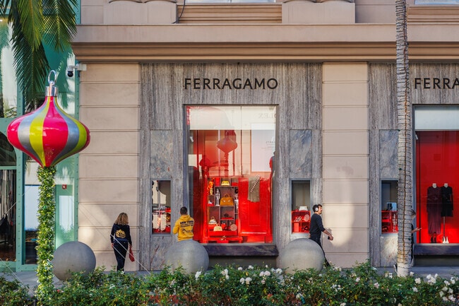 Tourists and locals alike can spend a day shopping at stores like Ferragamo on Rodeo Drive.