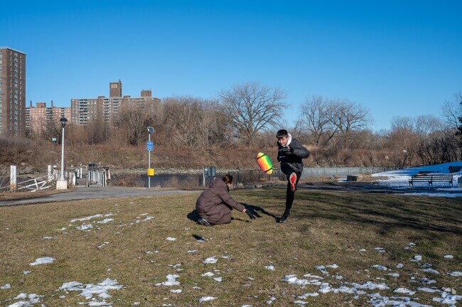 Families often gather by the Bronx River at Hunts Point Riverside Park.