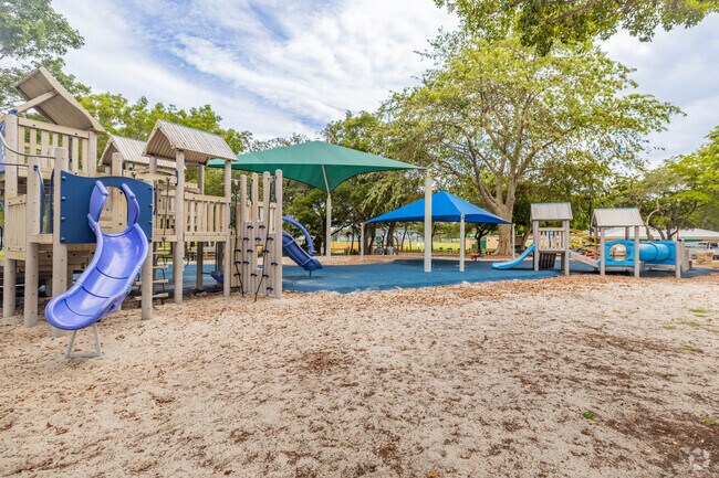 Enjoy playtime at the Colonial Drive Park playground in Palmetto Estates.