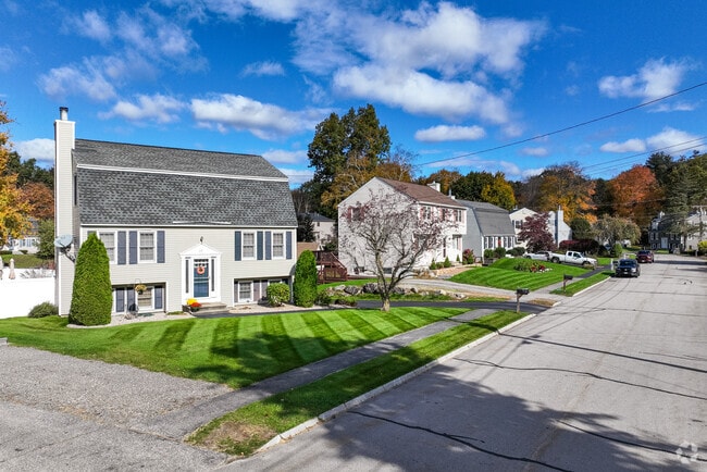 Manicured lawns are found in front of colonial homes in Northeast Nashua, NH.