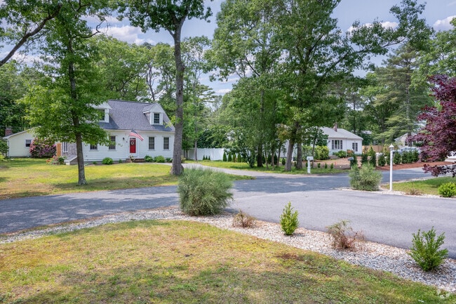Tall trees offer privacy from your Marstons Mills neighbors.