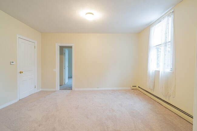 Living Room facing door to Master Bedroom
