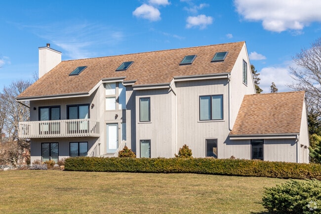 Modern homes in Newport's Ocean Drive neighborhood feature porches for enjoying water views.