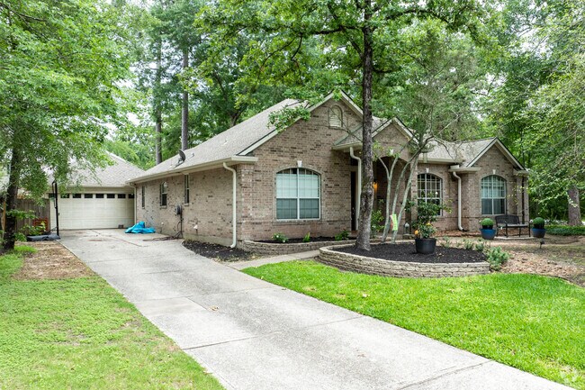 A quaint one-story new traditional home sits on a corner lot in Harper's Landing.