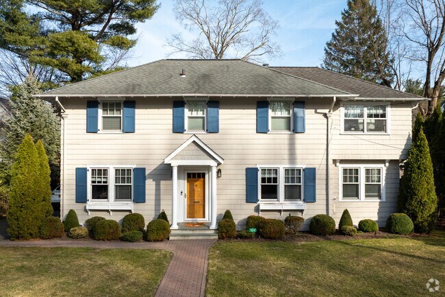 Stunning homes line the streets of Greenacres and have long walkways surrounded by well manicured lawns.