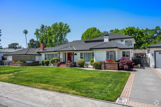 This split-level home has a tile roof and separate garage in Old West Sacramento.