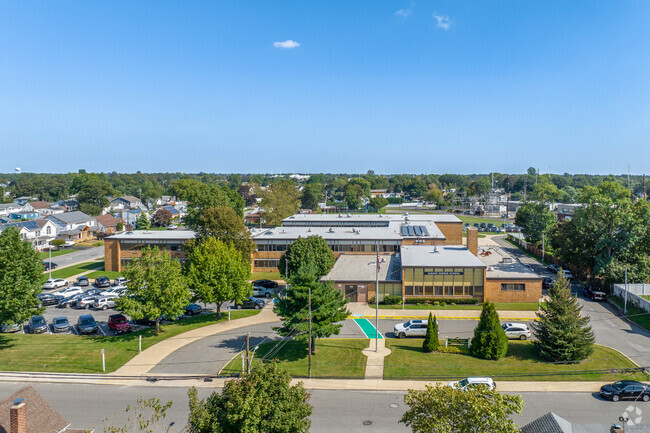 Albany Avenue Elementary School has 50 staff/faculty employed.
