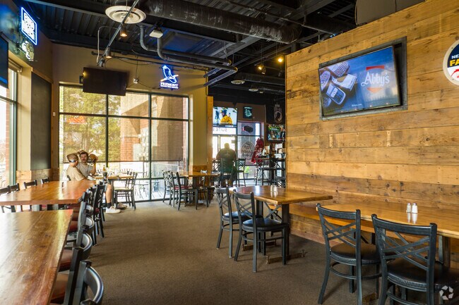 JJ's Smokehouse offers seating a viewing for local sports games.