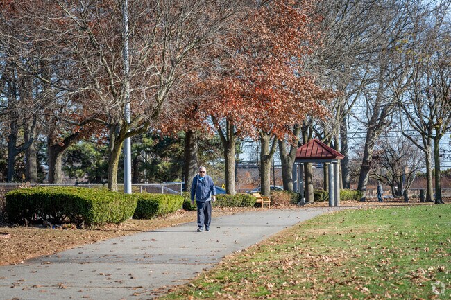 Take a sunny stroll through Doric Park with its baseball and basketball courts in Eden Park,