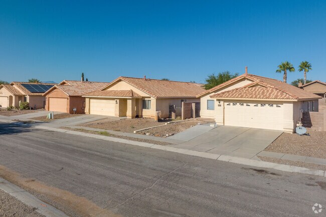 Spanish Revival-style homes with tile roofs line the streets of Mesquite Ranch.