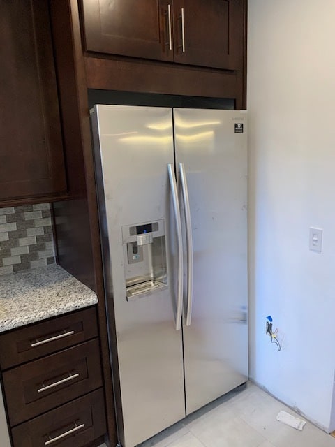 Beautiful large size refrigerator with pouring station of ice and water.
