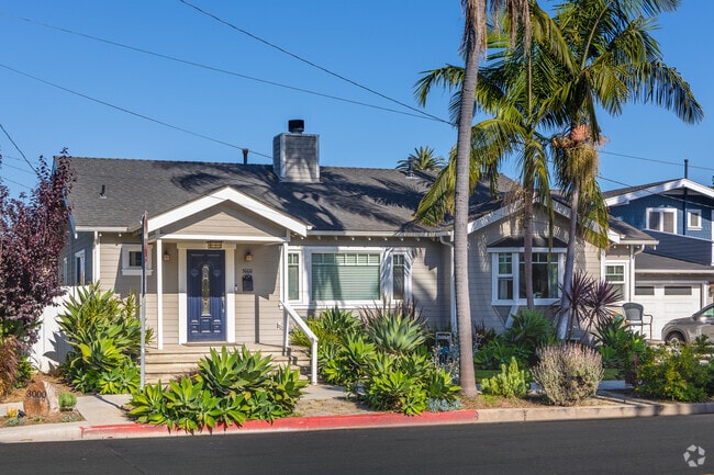Just steps from the beach, this row of homes sets this Bluff Park street apart.