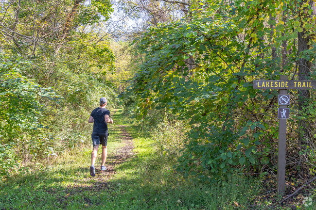 Hikers and runners alike enjoy  Lakeside Trail at Bald Eagle State Park in Howard. .