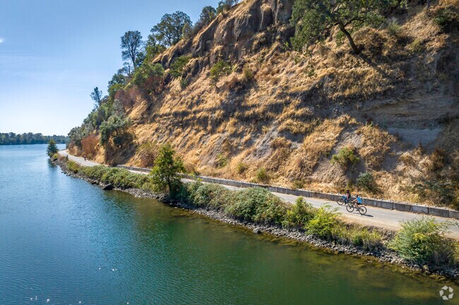 There are miles of biking trails along the American River in Fair Oaks.