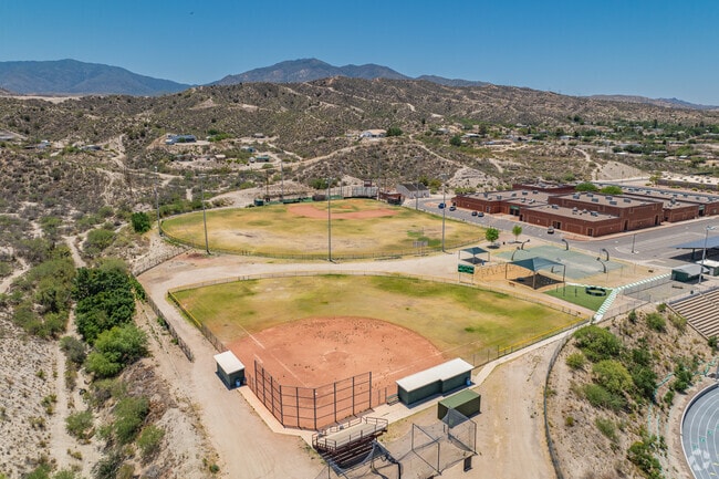 Miami Junior Senior High School is designed with multiple wings and outdoor walkways, promoting campus flow and access.