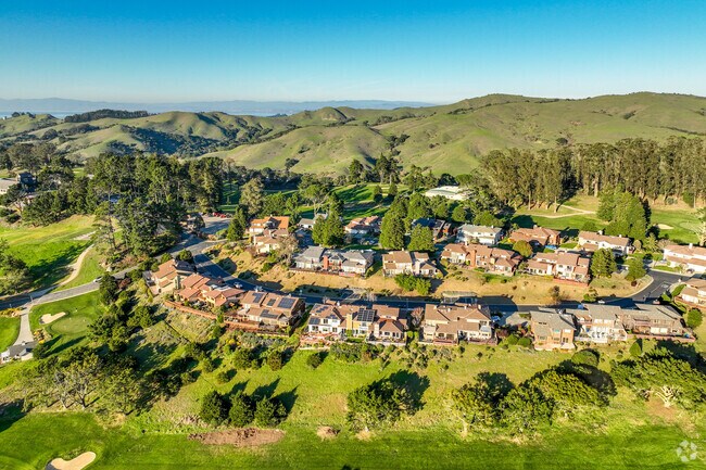 The sloping, curvilinear streets in the hills are lined with single family homes in El Cerrito.
