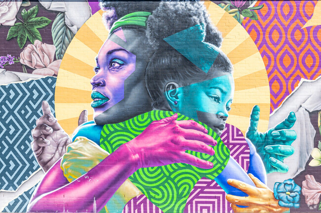 The Homeland near Forest Park is decorated with colorful murals.