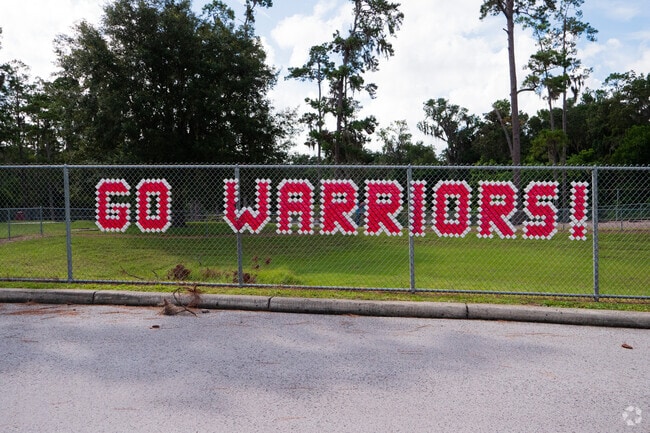 Wyomina Park Elementary School
has go warriors written across teh field fence!