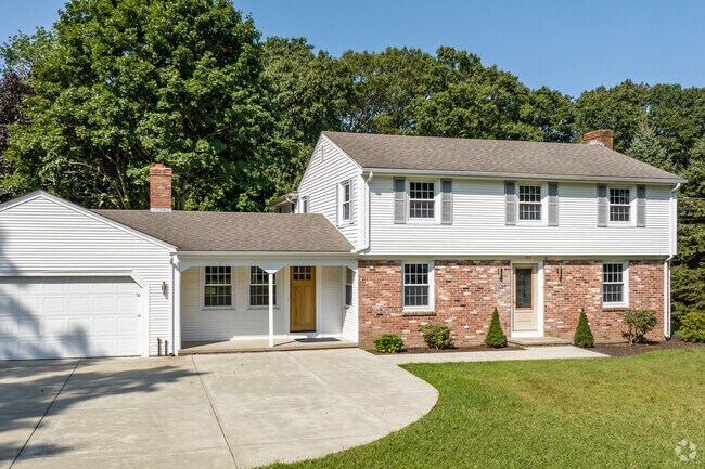 This modern colonial style home in the Monroes / South Seekonk neighborhood has a large yard.