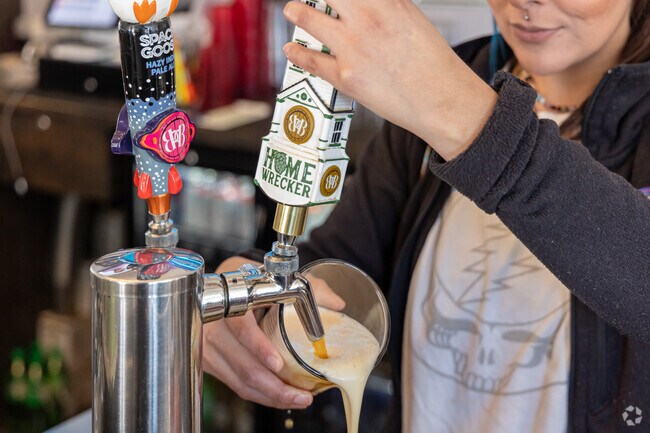 Enjoy local brews, cocktails, and more at The Park House in downtown Siloam Springs.